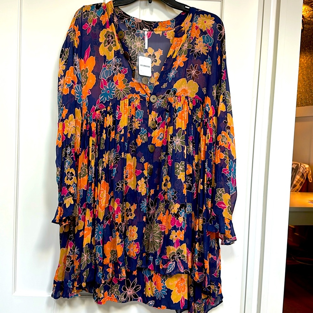 Free People mini dress. floral. Under slip included